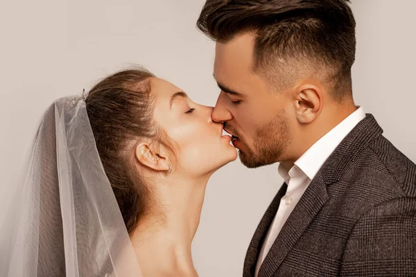 Side View Young Newlyweds Kissing Closed Eyes Isolated Grey — Stok fotoğraf