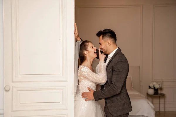 Side View Laughing Bride Touching Nose Happy Groom Entrance Bedroom — Stock Photo, Image