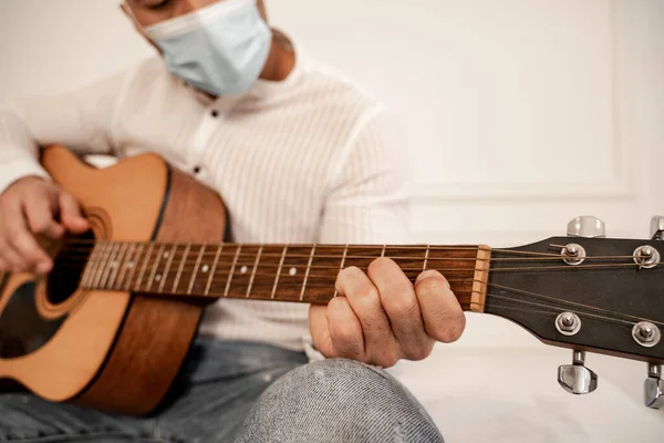 Cropped View Blurred Man Medical Mask Playing Guitar Home — 스톡 사진