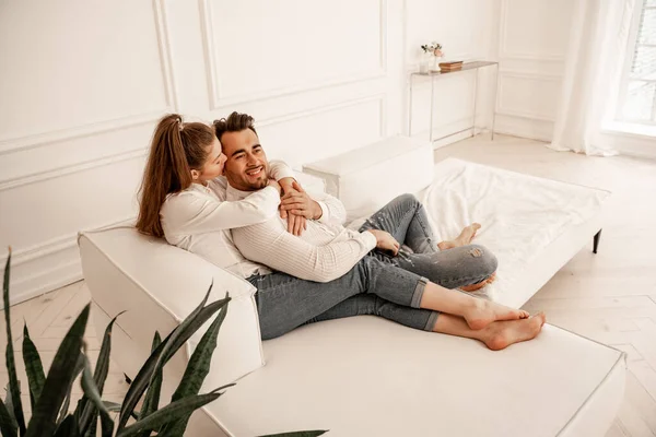 Young Barefoot Couple Jeans Resting Couch Living Room — Foto de Stock