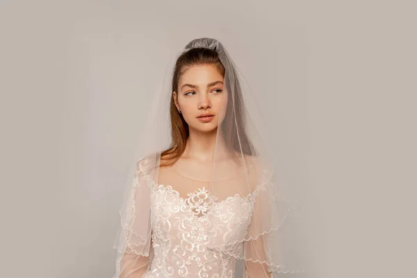 Young Woman Wedding Dress Veil Looking Away Isolated Grey — Stock Photo, Image