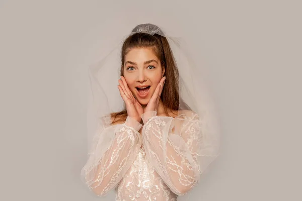 Amazed Bride Touching Face Looking Camera Isolated Grey — Stock Photo, Image