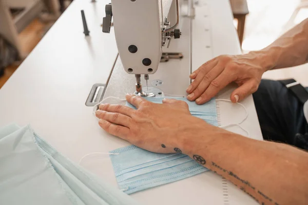 Cropped View Tailor Sewing Medical Mask Blurred Cloth — Stock Photo, Image