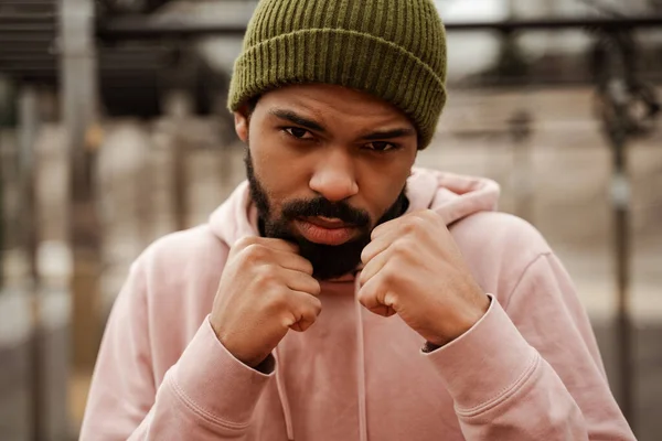 Young, bearded african american boxer training outdoors — Stock Photo