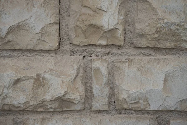 Muur Van Natuurstenen Van Verschillende Maten Licht Beige Kleur Achtergrond — Stockfoto