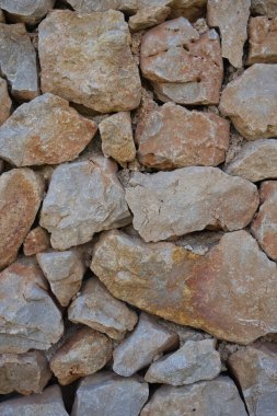 Terracotta tonlarında doğal taş arka plan. Dünya renkleri. Arkaplan kavramı.