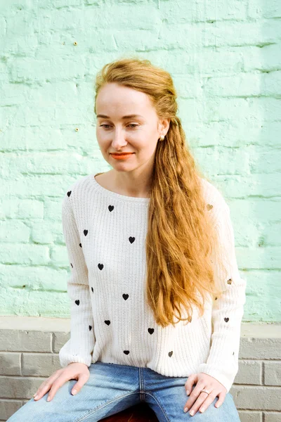 Young beautiful long-haired hipster girl.