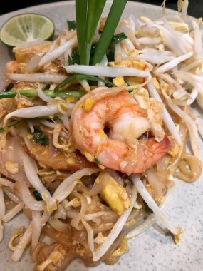 Authentic prawns Pad Thai noodles served in Thailand