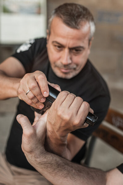 Self defense techniques against a gun