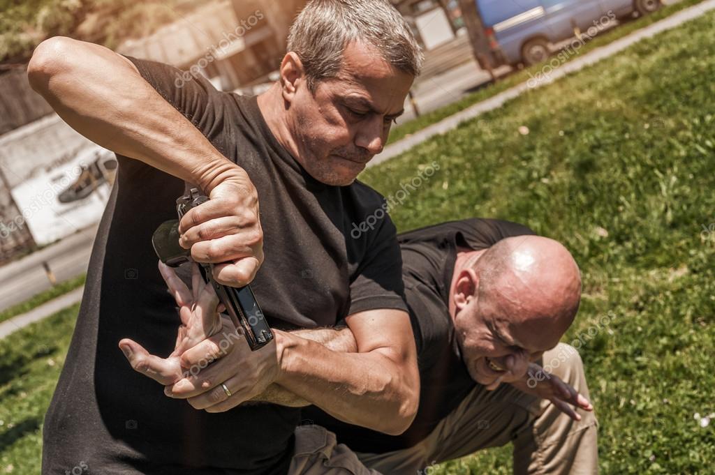 Self Defense Techniques Against A Gun Stock Photo By C Guruxox