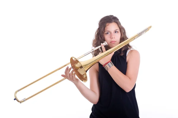 Adolescente tocando trombone — Fotografia de Stock