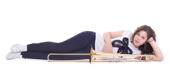 Tonårsflicka med trombon — Stockfoto