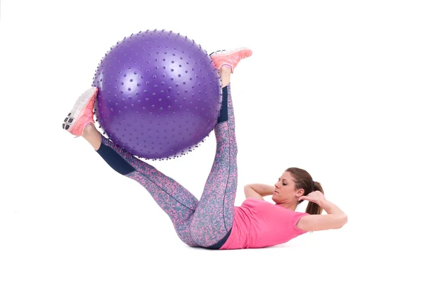Woman exercise with a pilates ball — Stock Photo, Image