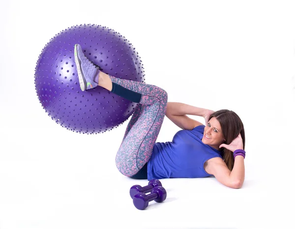 Woman exercise with a pilates ball — Stock Photo, Image