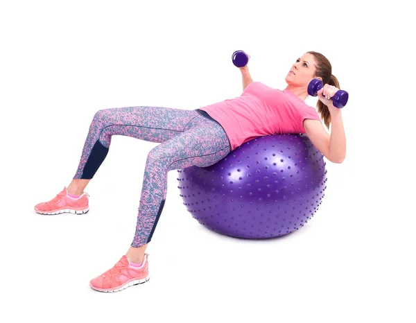 Woman exercise with a pilates ball — Stock Photo, Image