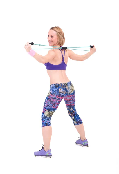 Woman exercising with a  resistance — Stock Photo, Image
