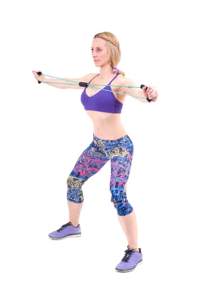 Woman exercising with a  resistance — Stock Photo, Image