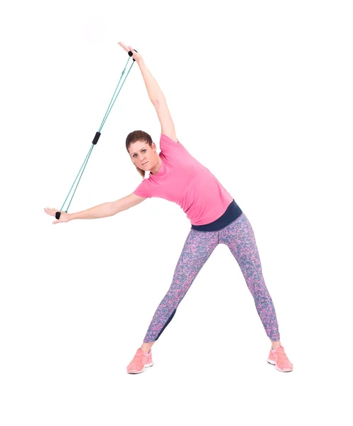 Woman exercising with a  resistance — Stock Photo, Image