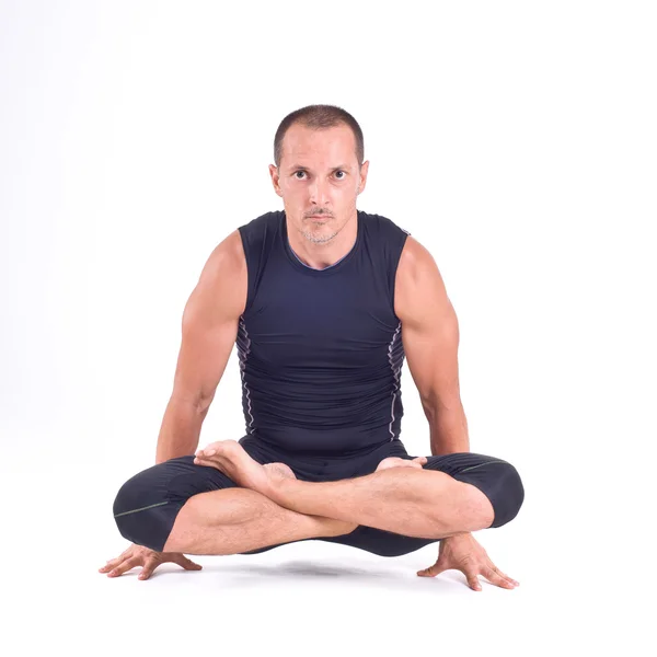 Praticar exercícios de Yoga Imagens Royalty-Free