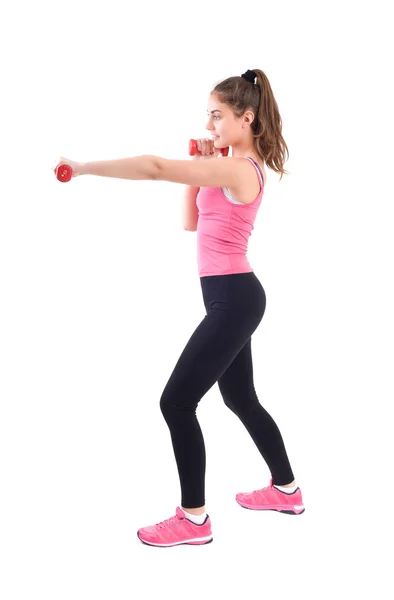 Ejercicio de mujer deportiva con pesas — Foto de Stock