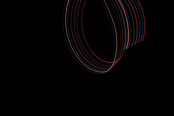 Lichtgekleurde Golvende Lijnen Een Zwarte Achtergrond — Stockfoto
