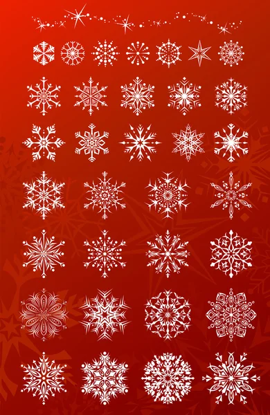 Flocons de neige sur fond rouge . — Image vectorielle