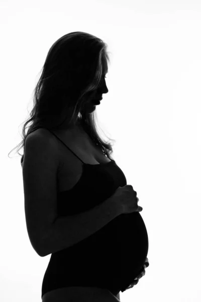 Silhouet Van Zwangere Vrouw Een Witte Achtergrond — Stockfoto