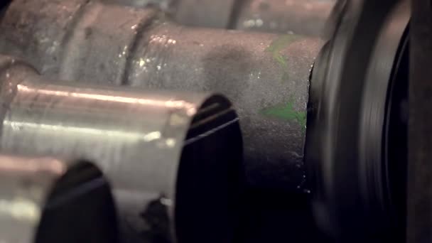 Close-up of a section of steel pipes stacked on top of each other. conveyor production of iron products — Stock Video