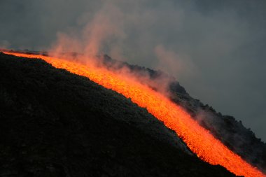 Lava flow on etna volcano clipart