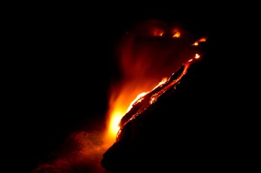 Lava flow at night clipart