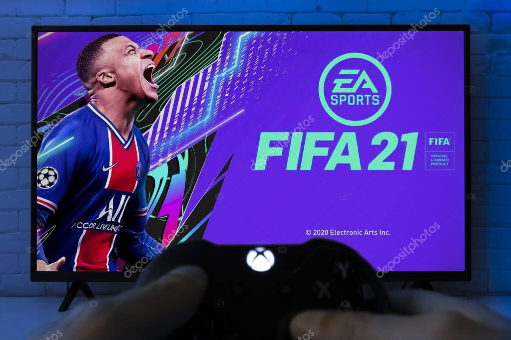 Man play FIFA 21 on Smart TV screen with Xbox Game Pass, 3 May, 2021, Sao Paulo, Brazil