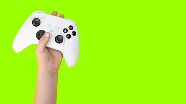 Kid Memegang Game Controller Dengan Latar Belakang Hijau Untuk Cropping — Stok Foto