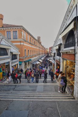 Venice, Italy - April 27, 2019: Beautiful view of crowded Streets of Venice from famous Rialto Bridge in Venice, Italy