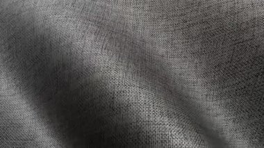 Gri pamuk kumaş dalgaları hafif dengeli bir animasyon halinde hareket ediyor. Minimum sessiz tasarım için mükemmel bir arka plan.