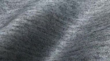 Gri pamuk dokusu dalgaları, yumuşak dengeli görseller ve özel bir arkaplan için mükemmel, az tanımlanmış animasyon katmanları yaratıyor.