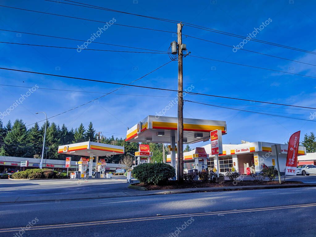 Kirkland, WA / USA - circa January 2020: Street view of a Shell gas pumping station on a clear sunny day in the pacific northwest