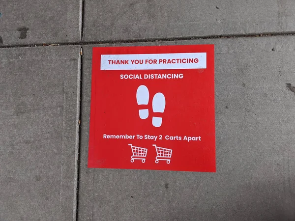 Signs instructing social distancing at the self checkout lines at a Safeway grocery store during the shelter in place order in Washington