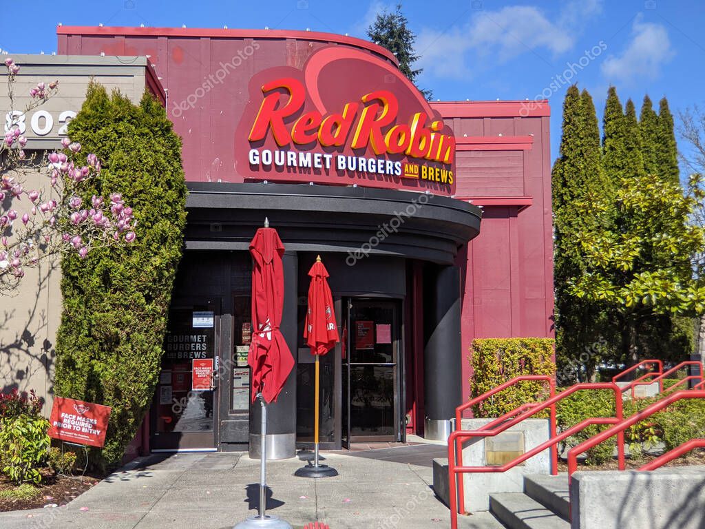 Woodinville, WA USA - circa April 2021: Street view of a Red Robin gourmet burger restaurant on a bright sunny day