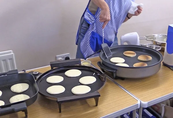 Pancake baking in a kitchen