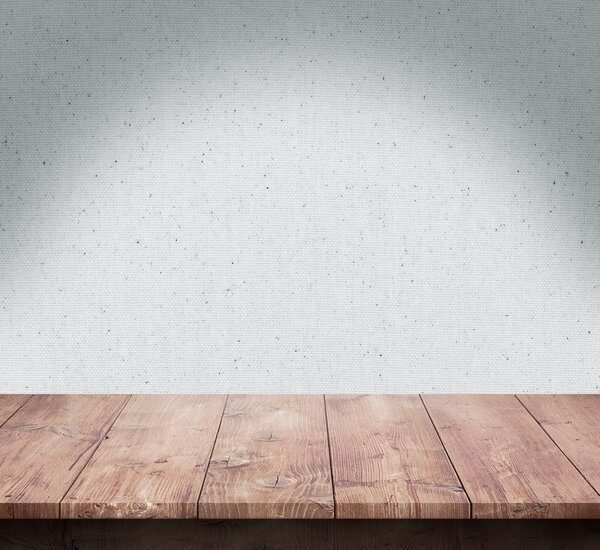 Wood table with fabric texture background