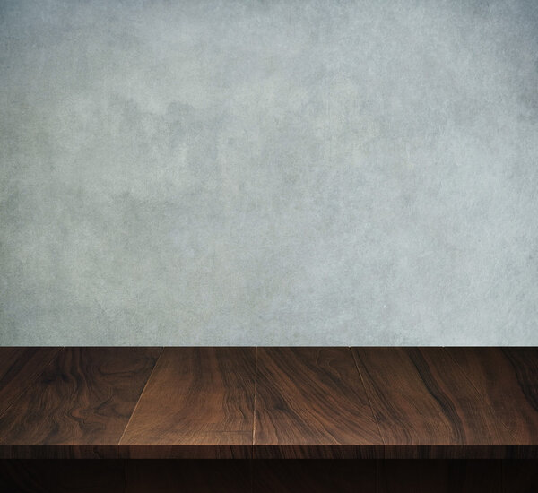 Wood table with concrete texture background