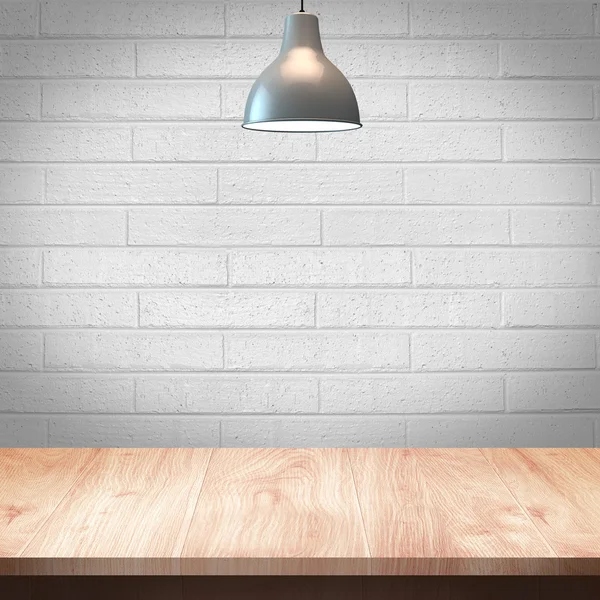 Mesa de madera con lámpara y fondo de pared de ladrillo — Foto de Stock