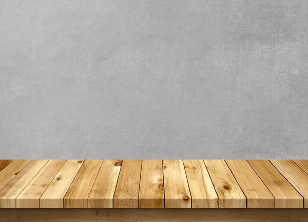 Деревянный стол с бетонным текстурным фоном — стоковое фото