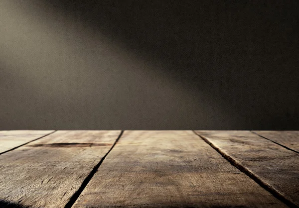 Wood table with dark background — Stock Photo, Image