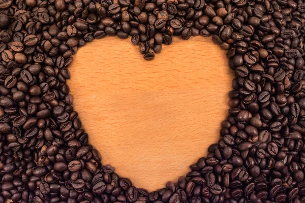 Coffee heart on the table — Stock Photo, Image