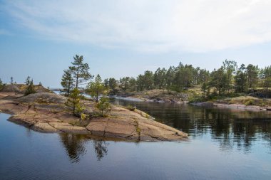 Wild rocky coast of Lake Ladoga in Karelia clipart
