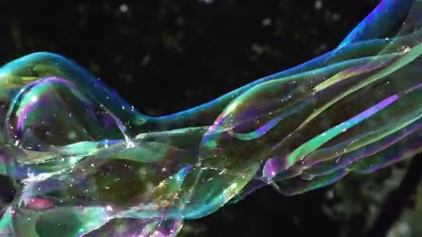 Multi-colored big bubble blower. Bubble wand. Soap bubbles show. — Stock Video