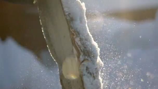 An unknown man chops wood in the winter. Lumberjack chopping wood — Stock Video