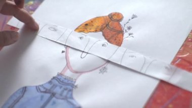 Suluboya çiziyor. Çizim Tekniği. Yüz özelliklerinin seçimi.