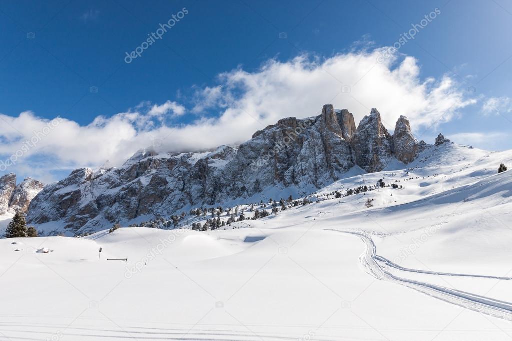 View of the Sella Group with snow in the Italian Dolomites from the ski area